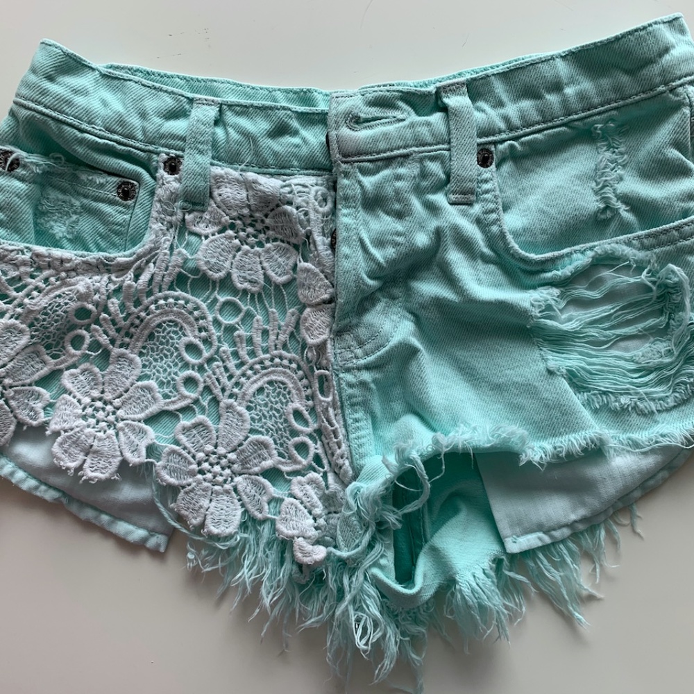 Carmar turquoise denim cutoff shorts